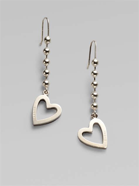 gucci silver heart drop earrings|gucci interlocking g silver earrings.